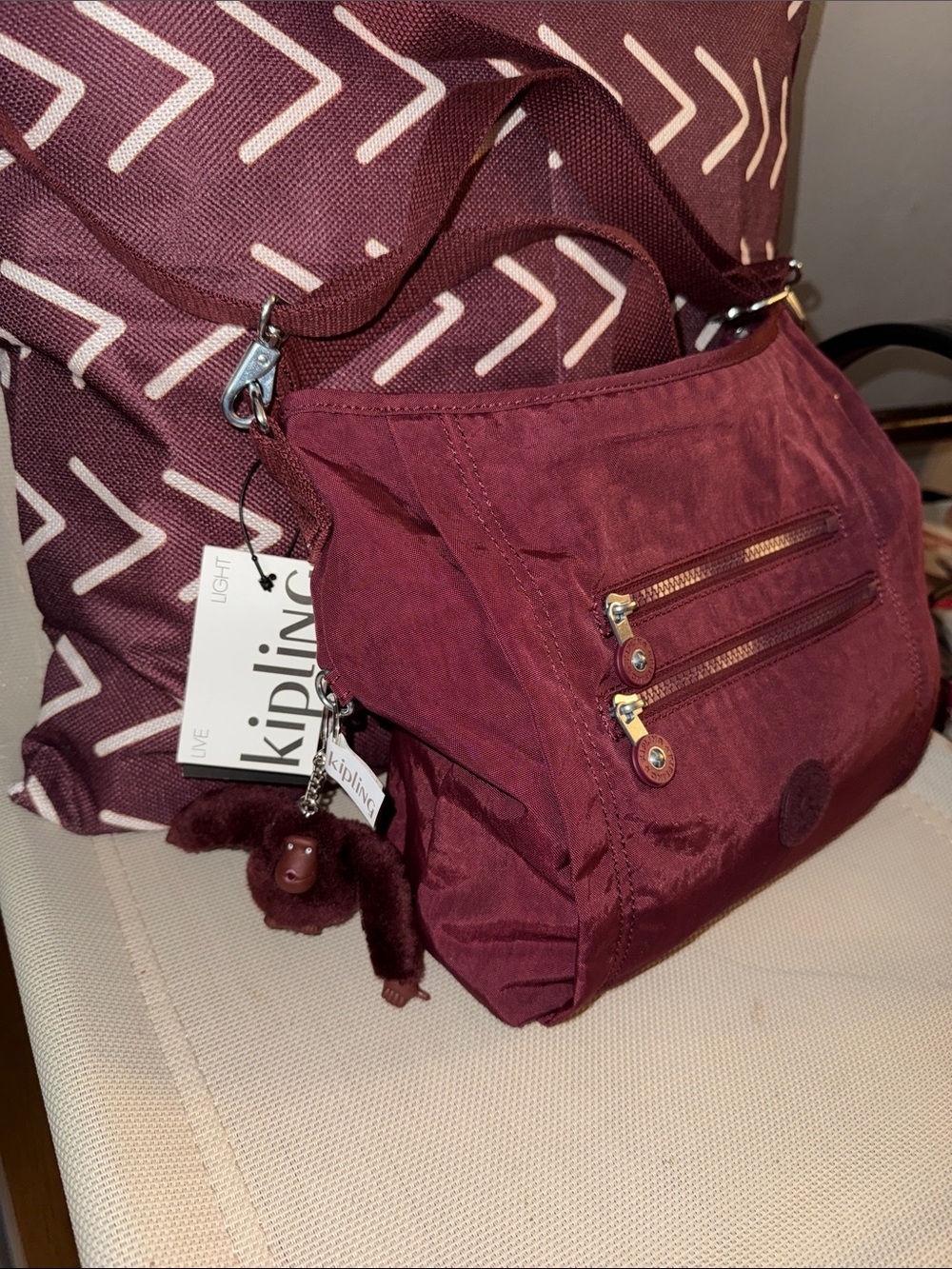 Kipling Wine/Burgundy Crossbody Bag with Monkey Charm